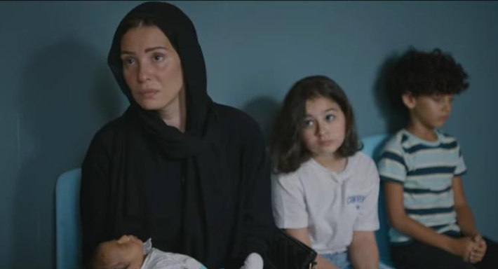  إيمان العاصى تدخل السجن فى برومو "برغم القانون"